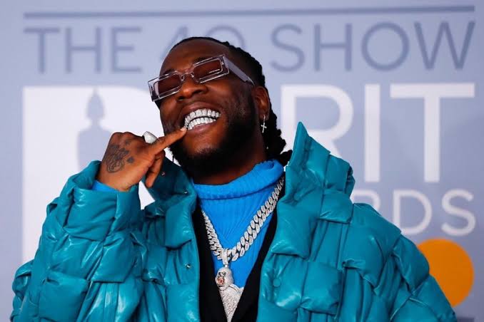 Burna Boy Gifts Cybertruck to King Manny, Throws Subtle Shade at Rivals