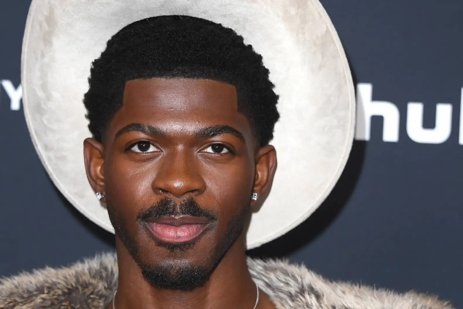 “Lil Nas X arrested in Los Angeles for battery on a police officer, set to remain in jail until Monday.”